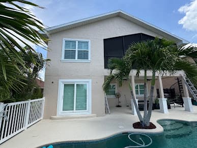 Freshly repainted two-story home with pool in Land O' Lakes, Florida